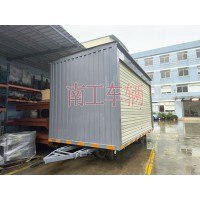 10吨箱式平板拖车两侧带卷帘门 牵引雨篷拖车